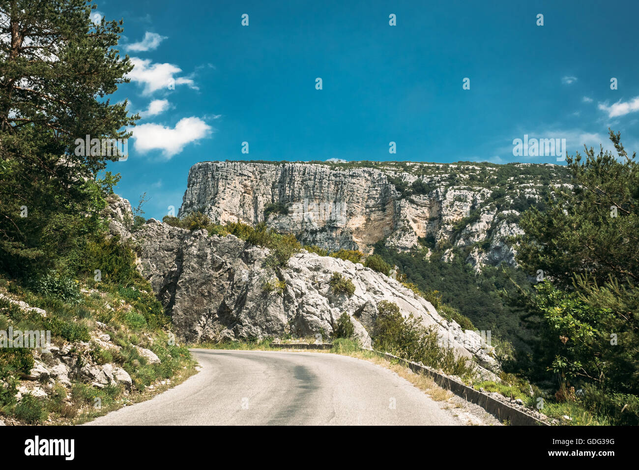 Beautiful Open Asphalt Mountain Road Under Sunny Blue Sky. Verdon Gorge In France. French Landscape Stock Photo