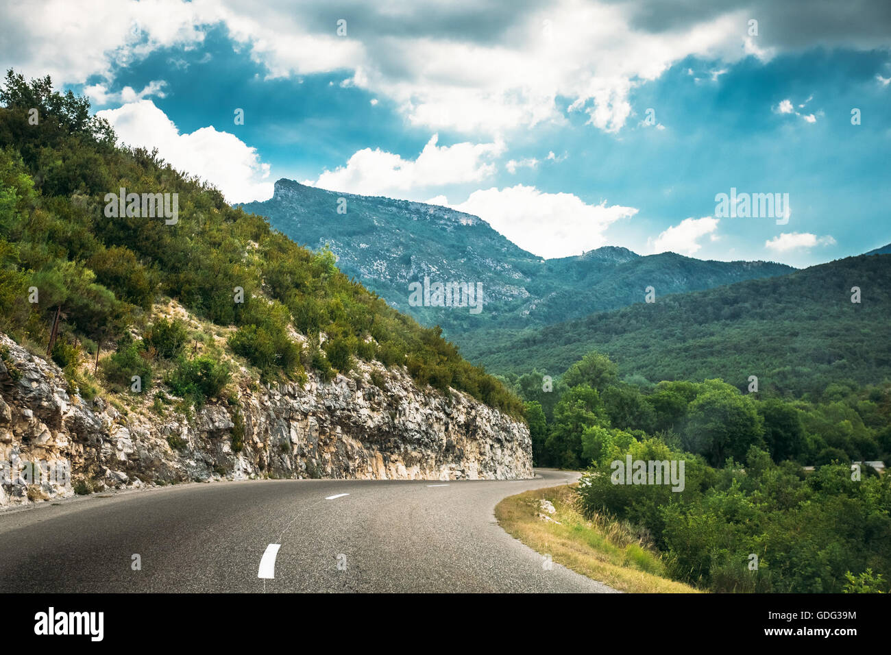 Beautiful Open Asphalt Mountain Road Under Sunny Blue Sky. Verdon Gorge In France. French Landscape Stock Photo
