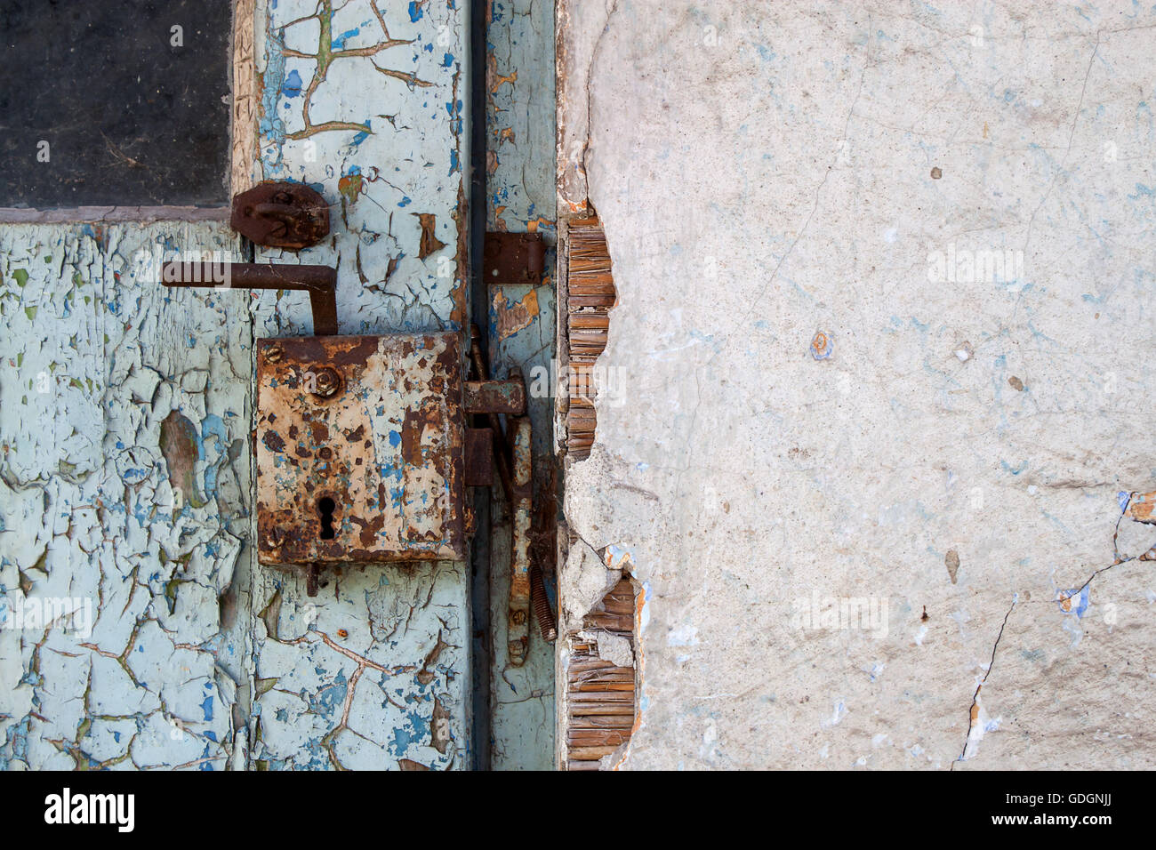 old wooden door with metal lock detail Stock Photo - Alamy