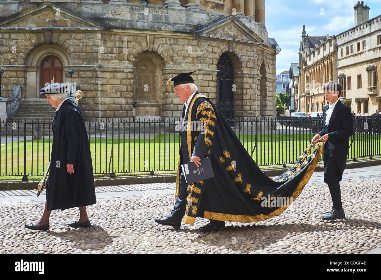 The Encaenia ceremony at the University of Oxford in 2015 including Chancellor Chris Patten walking past the Radcliffe Camera Stock Photo
