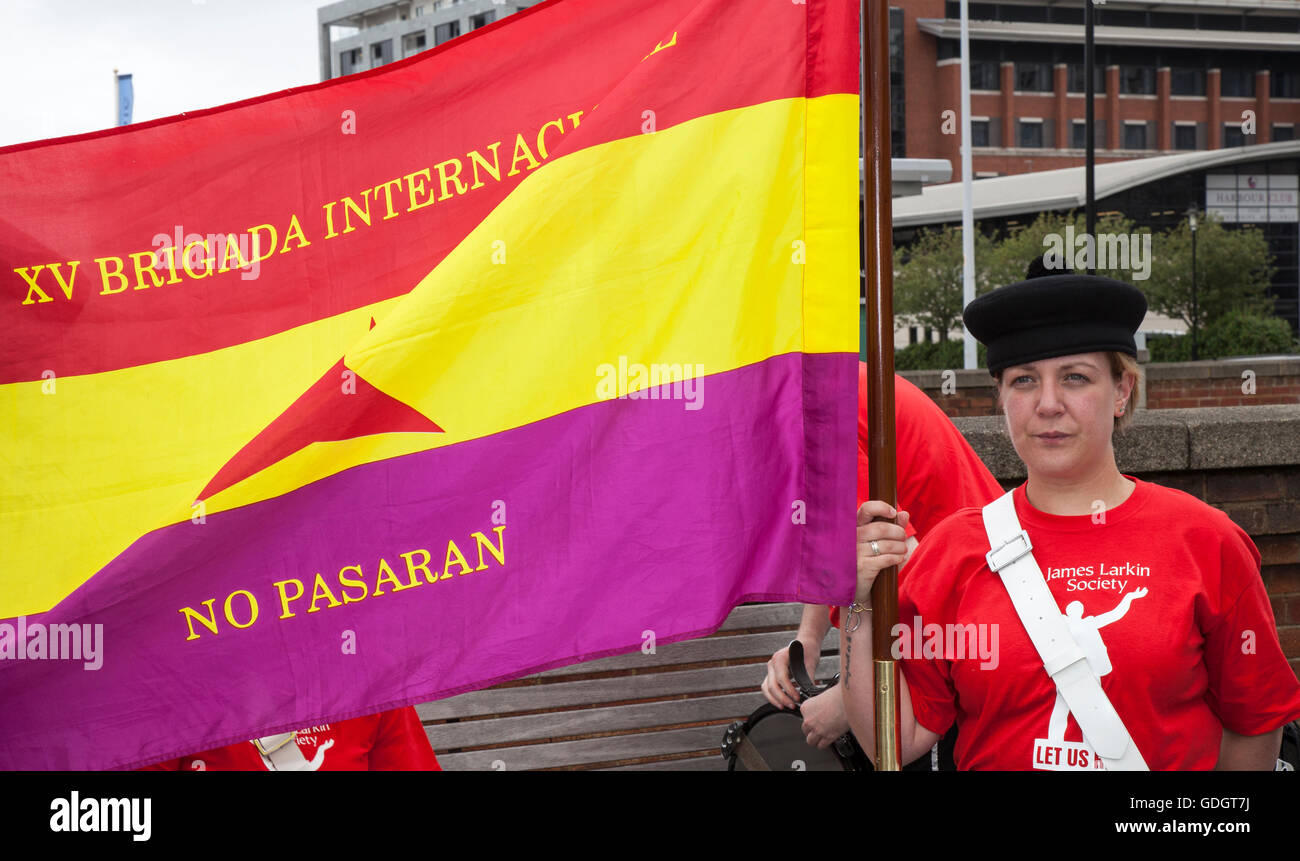 2016. The Abraham Lincoln Brigade, officially the XV International Brigade, a mixed brigade that fought for the Spanish Republic in the Spanish Civil War as a part of the International Brigades. Liverpool James Larkin March and Rally to remember the Abraham Lincoln  International Brigade. Spanish Republican flag with red 3-point star emblem logo of the International Brigades Merseyside. UK Stock Photo