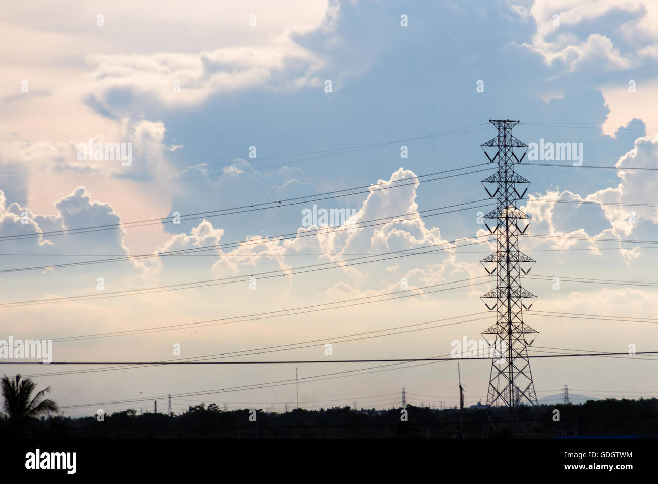 High voltage electric tower in the blue sky white cloud background ...