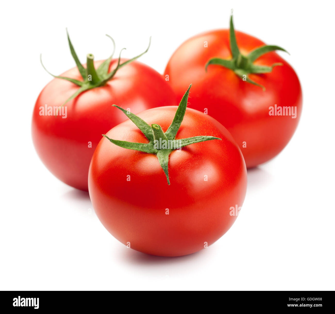 Three red ripe tomatoes isolated on white background Stock Photo