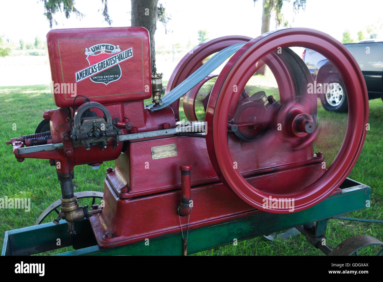 United Engine Company stationary engine running at an antique show in Whitehall, Michigan. Stock Photo