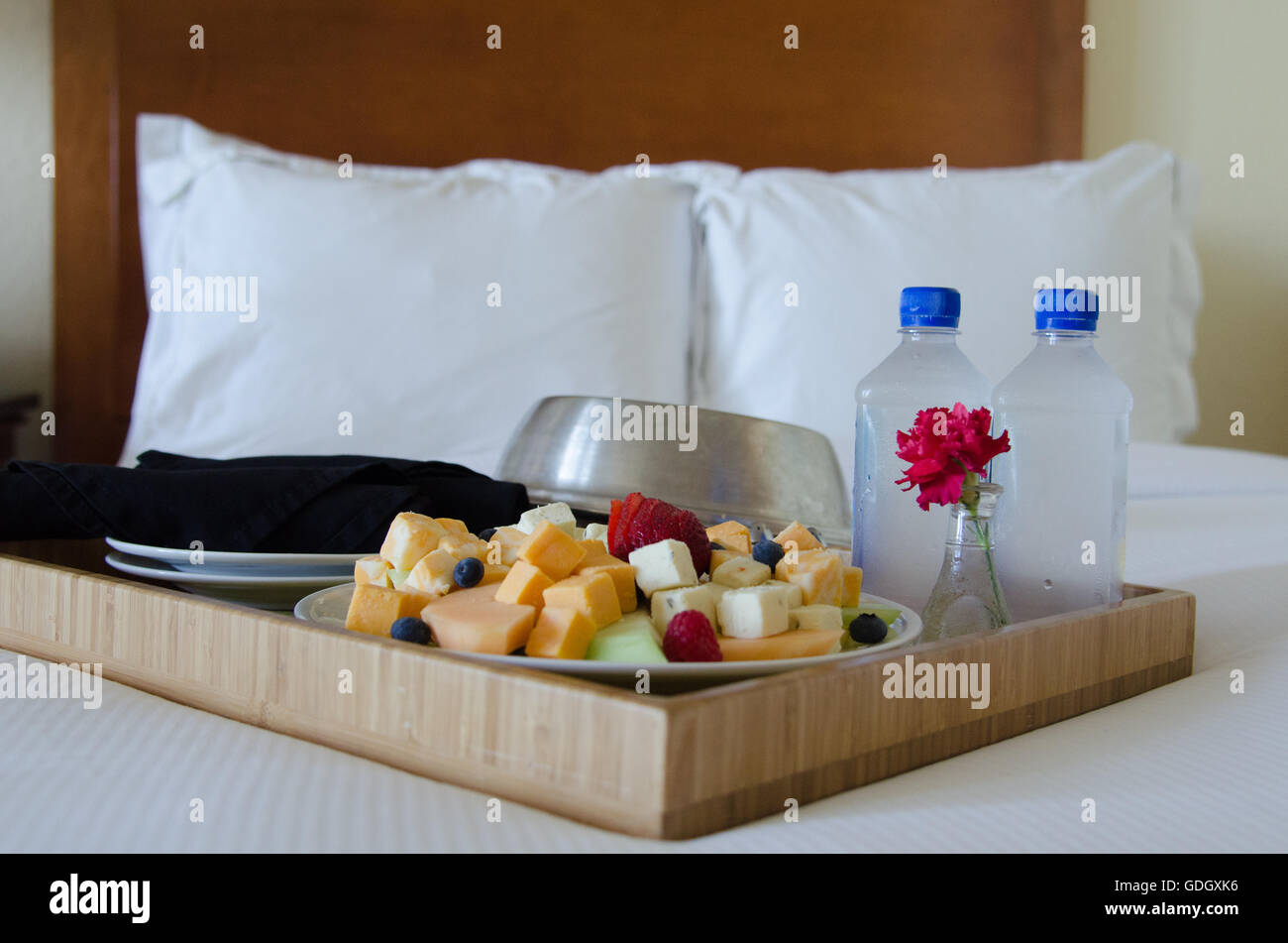 room service tray with fruit and cheese in hotel room Stock Photo Alamy
