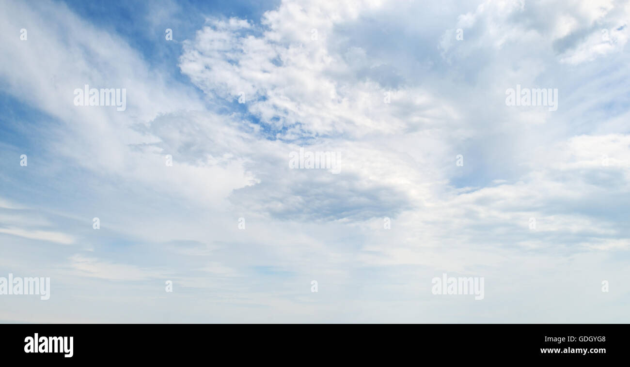 fluffy clouds in the blue sky Stock Photo - Alamy