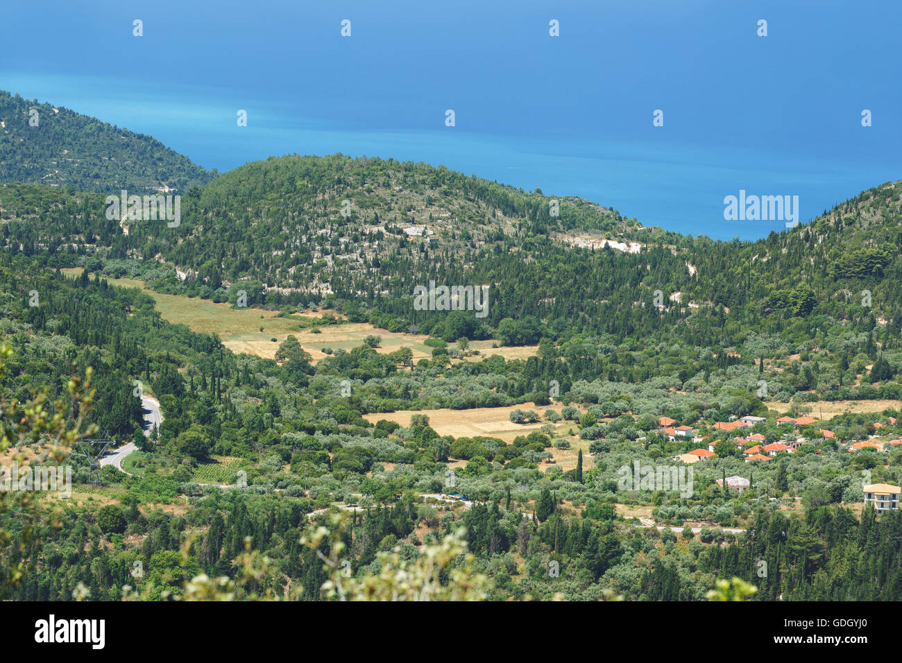 Village of Kalamitsi, Lefkada, Greece. Panoramic view on Kalamitsi village and Lefkada coast on a beautiful sunny day Stock Photo