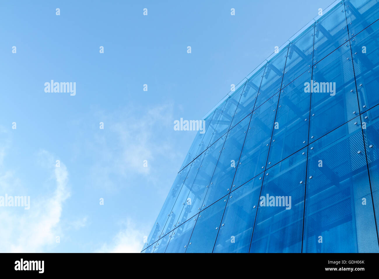 Sky reflected in a modern building glass facade Stock Photo - Alamy