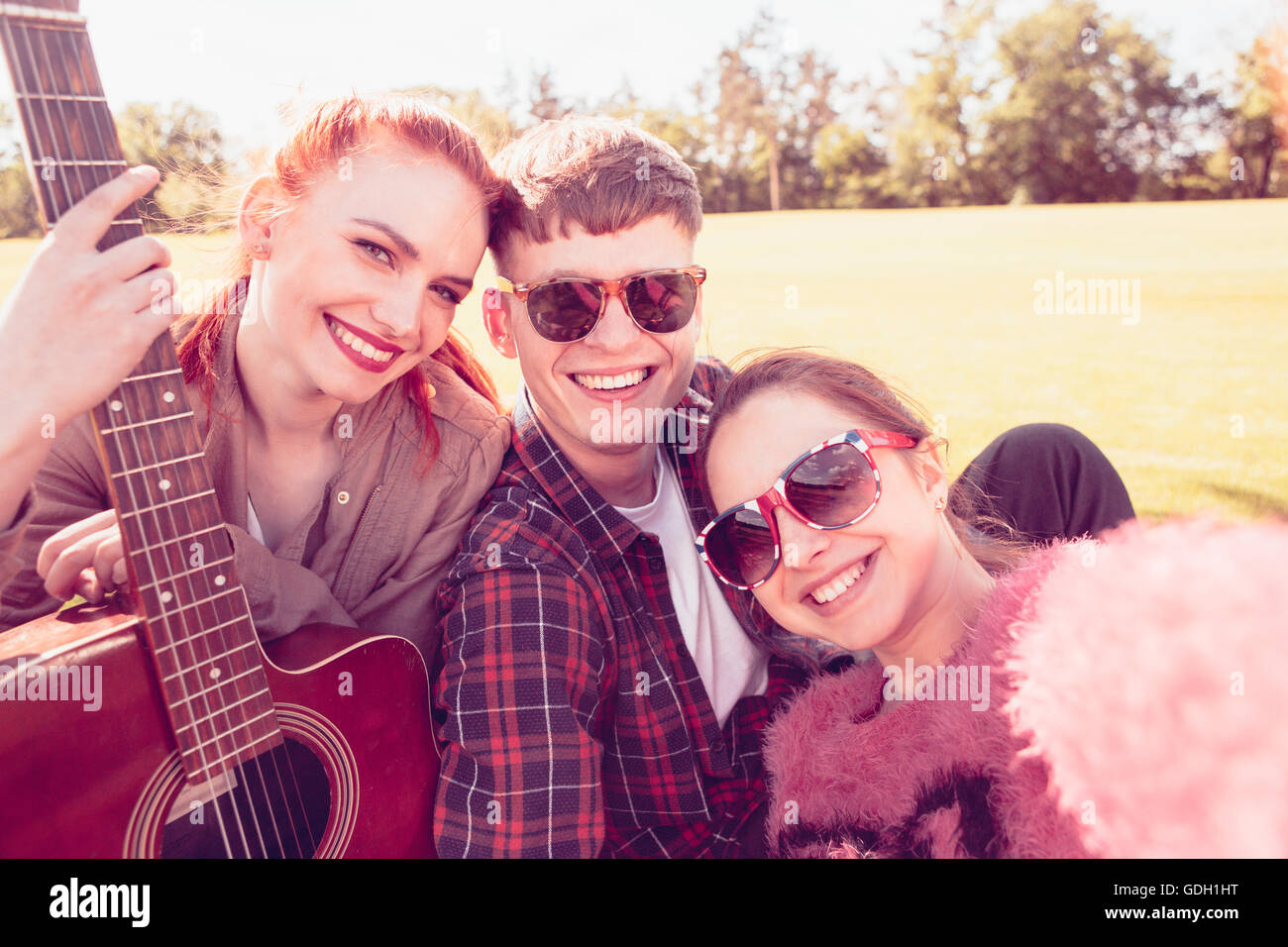 Best friends making selfies on picnic Stock Photo Alamy