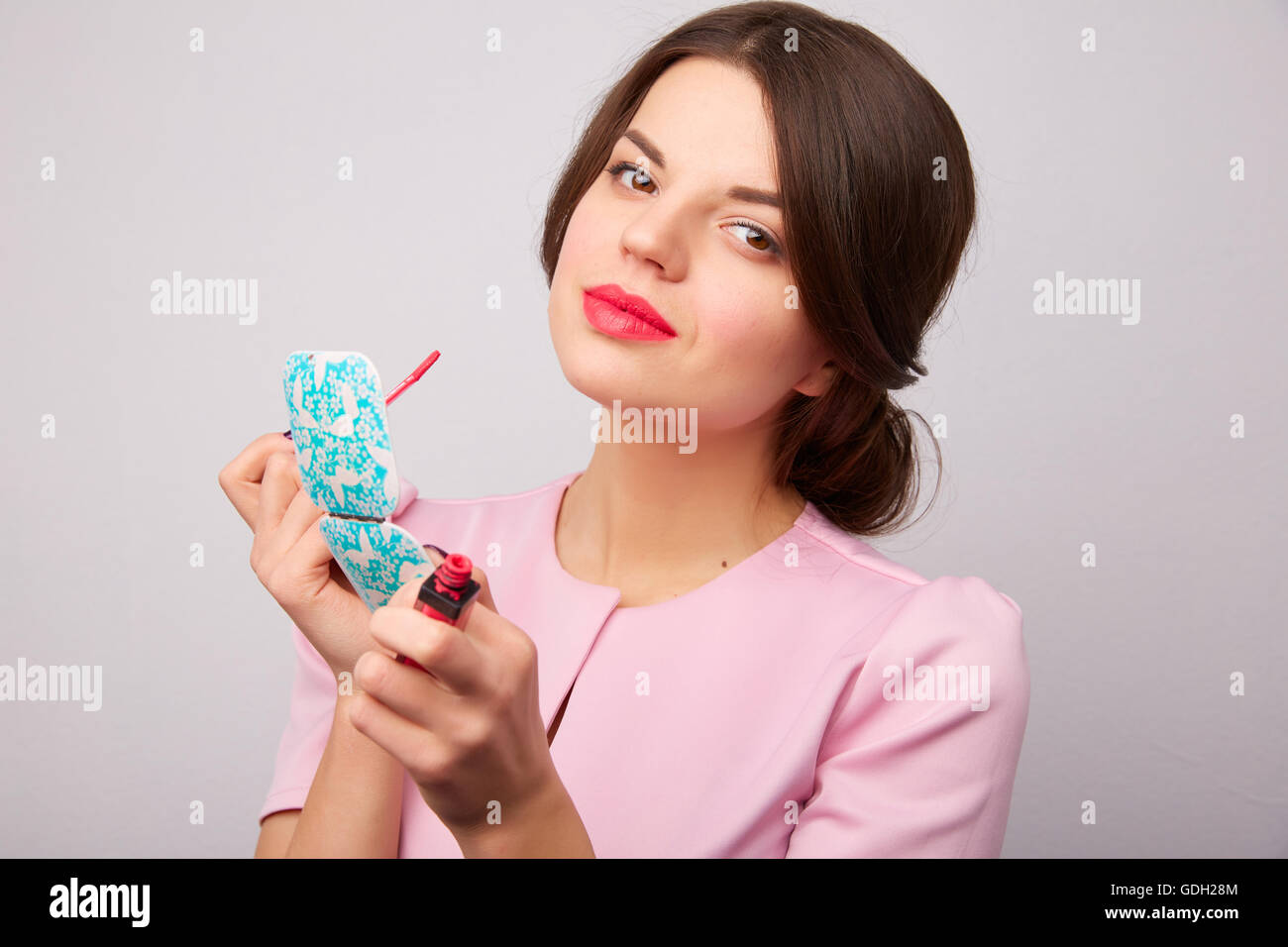 girl gets lipstick Stock Photo Alamy
