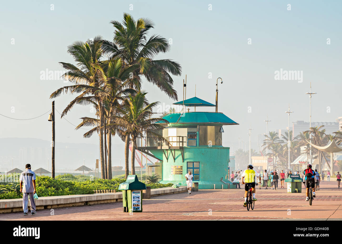 DURBAN, SOUTH AFRICA - APRIL 16, 2016: Locals and tourists near the lifesaver's station on The Golden Mile promenade Stock Photo