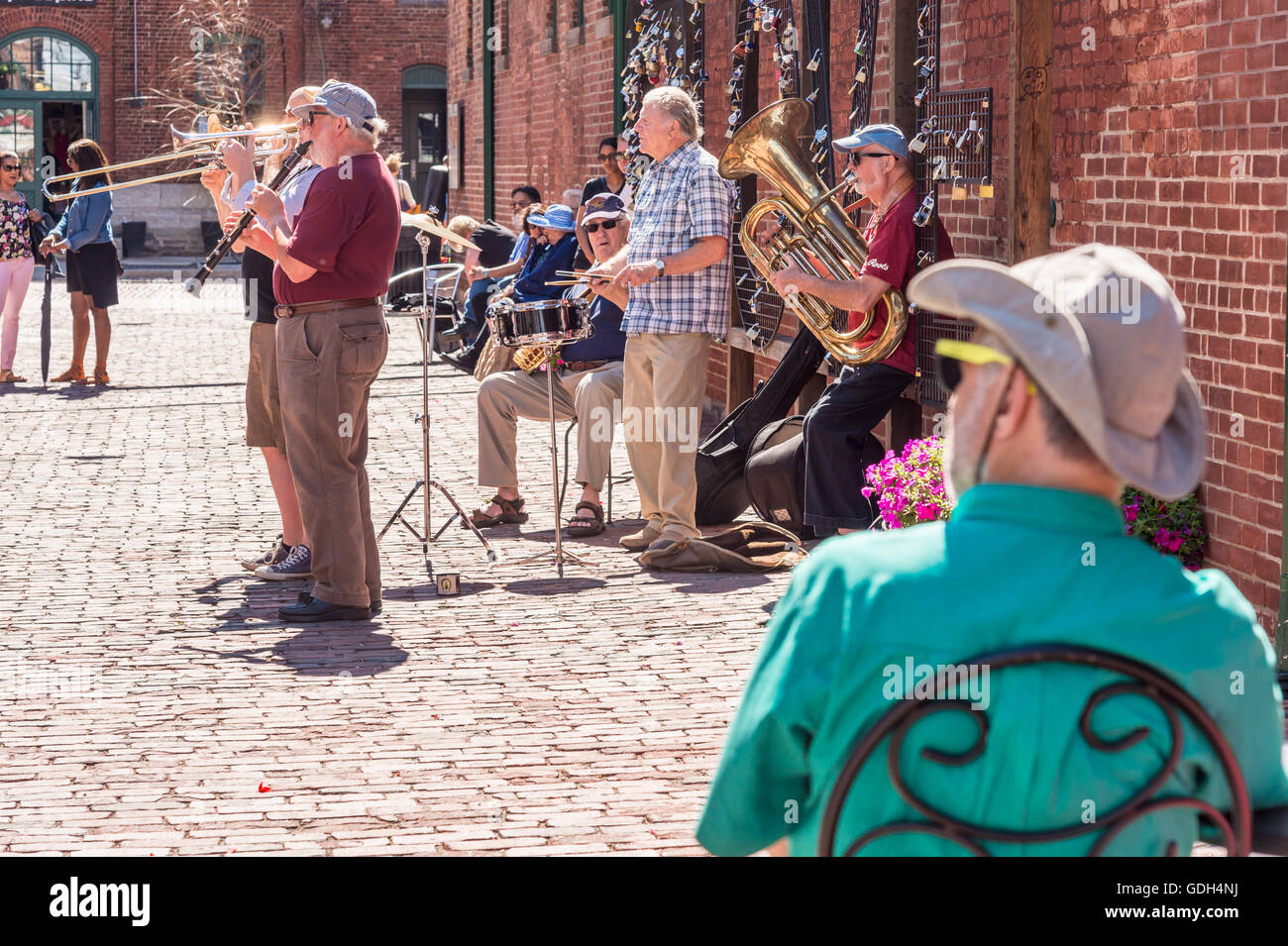 TORONTO, CANADA - JULY 1, 2016: Band playing music in the street, in Distillery District. Stock Photo