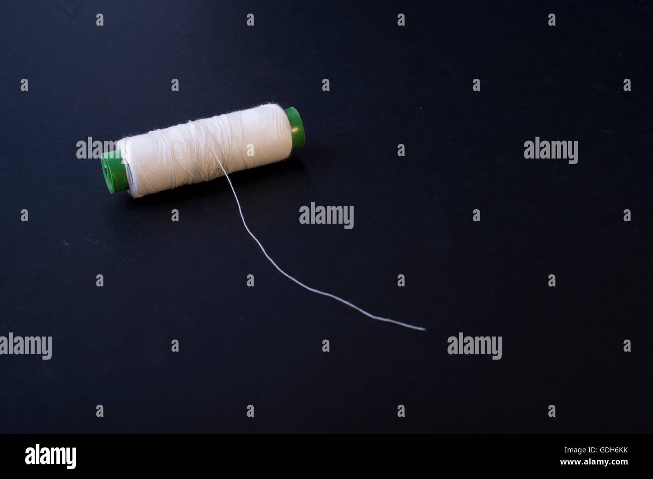 White thread on bobbin Stock Photo Alamy