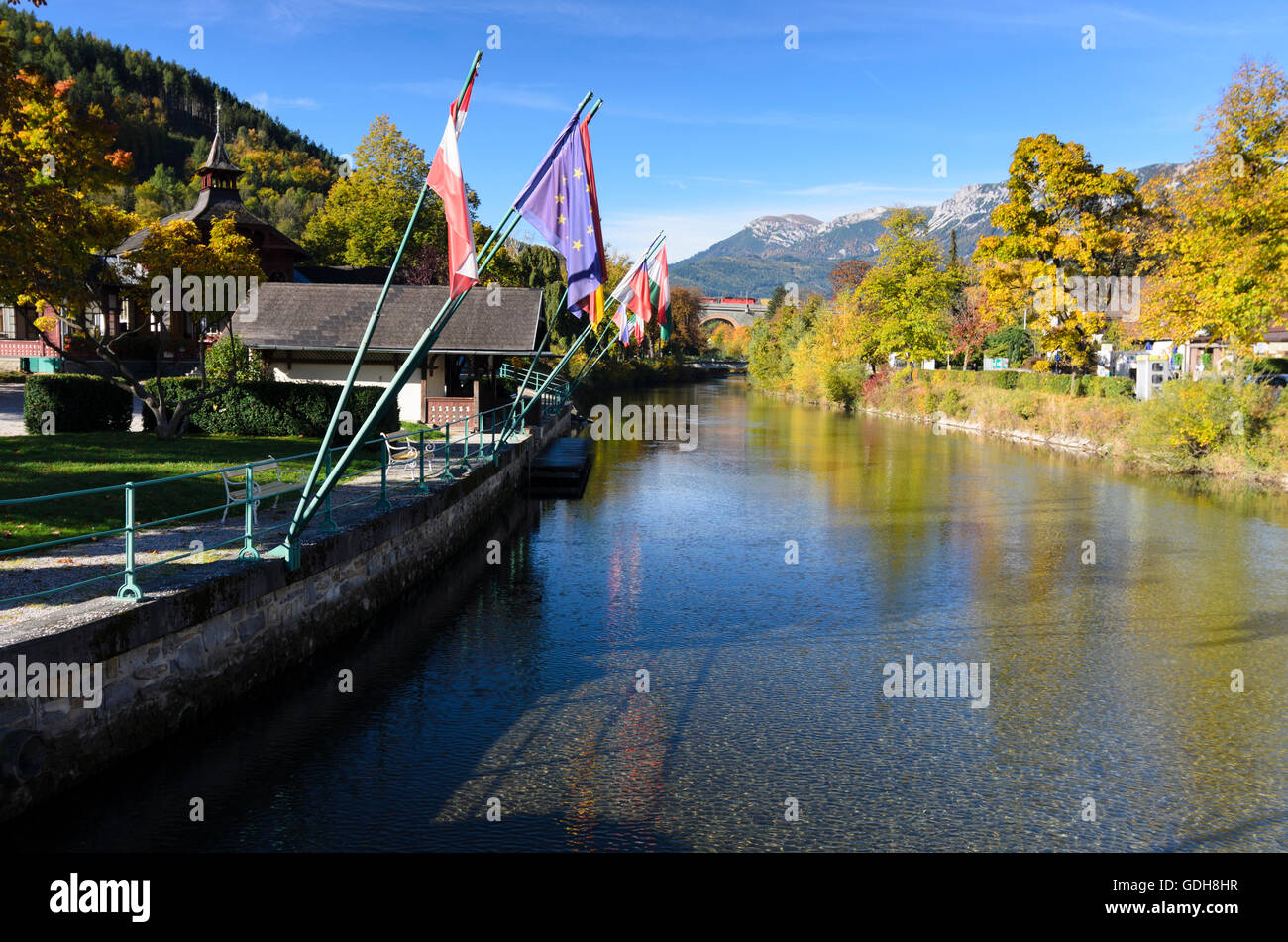 Payerbach: Park with flags on River Schwarza Schwarza viaduct and the railroad Semmeringbahn, Austria, Niederösterreich, Lower A Stock Photo