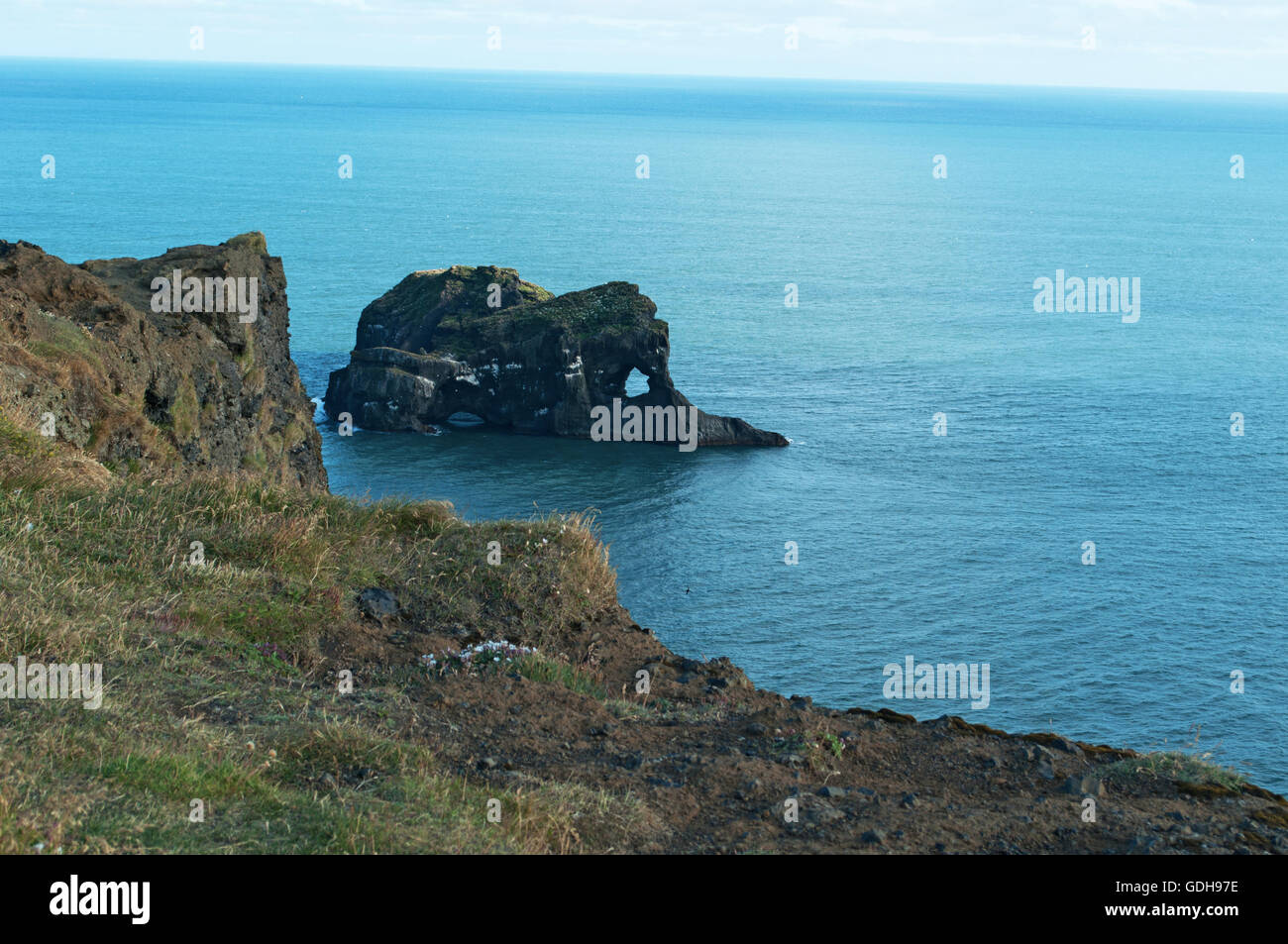 Iceland: rocks and Artic Ocean, view from the promontory of Dyrholaey, near Vik i Myrdal Stock Photo