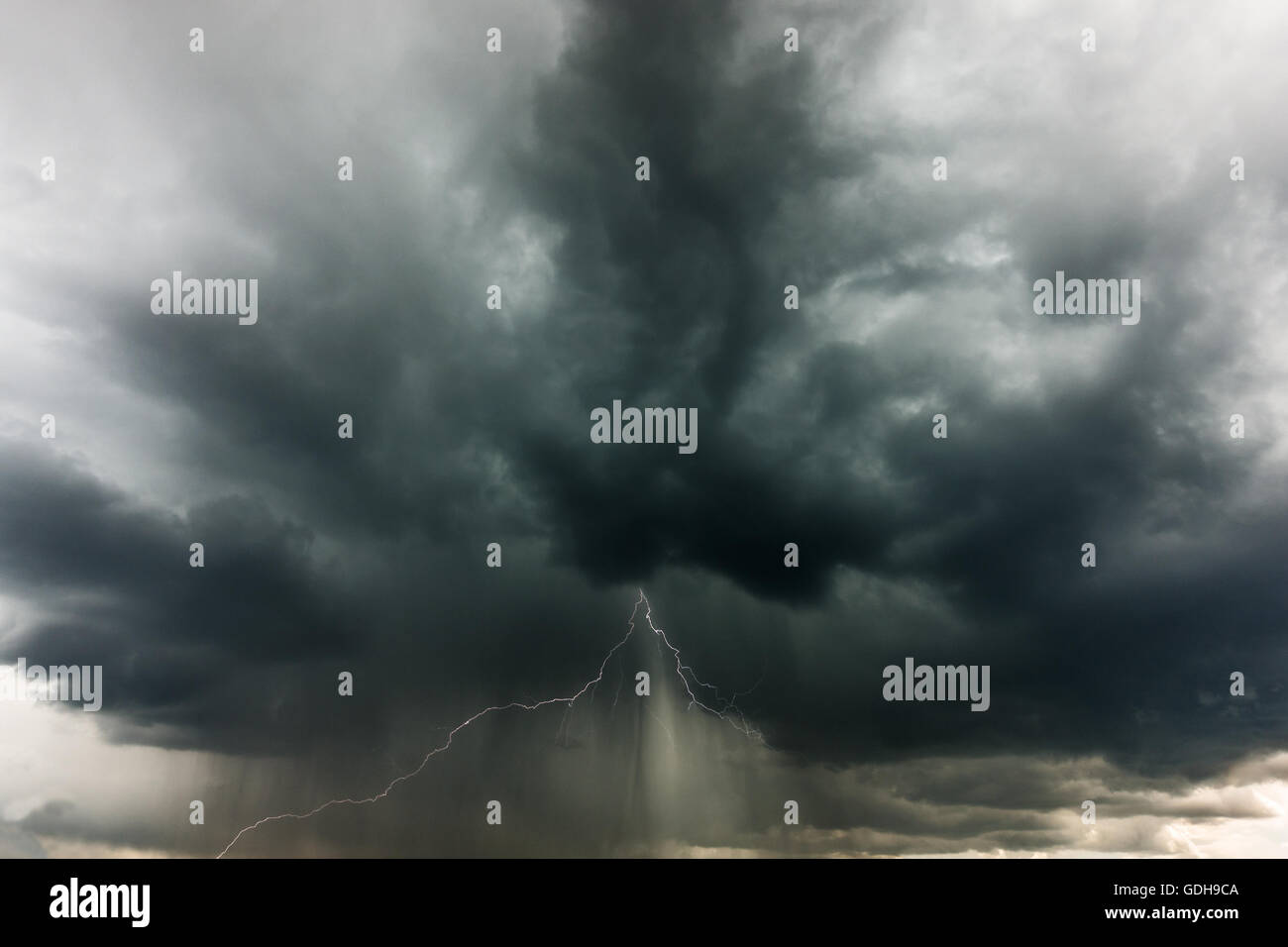 Storm clouds and lightning Stock Photo - Alamy