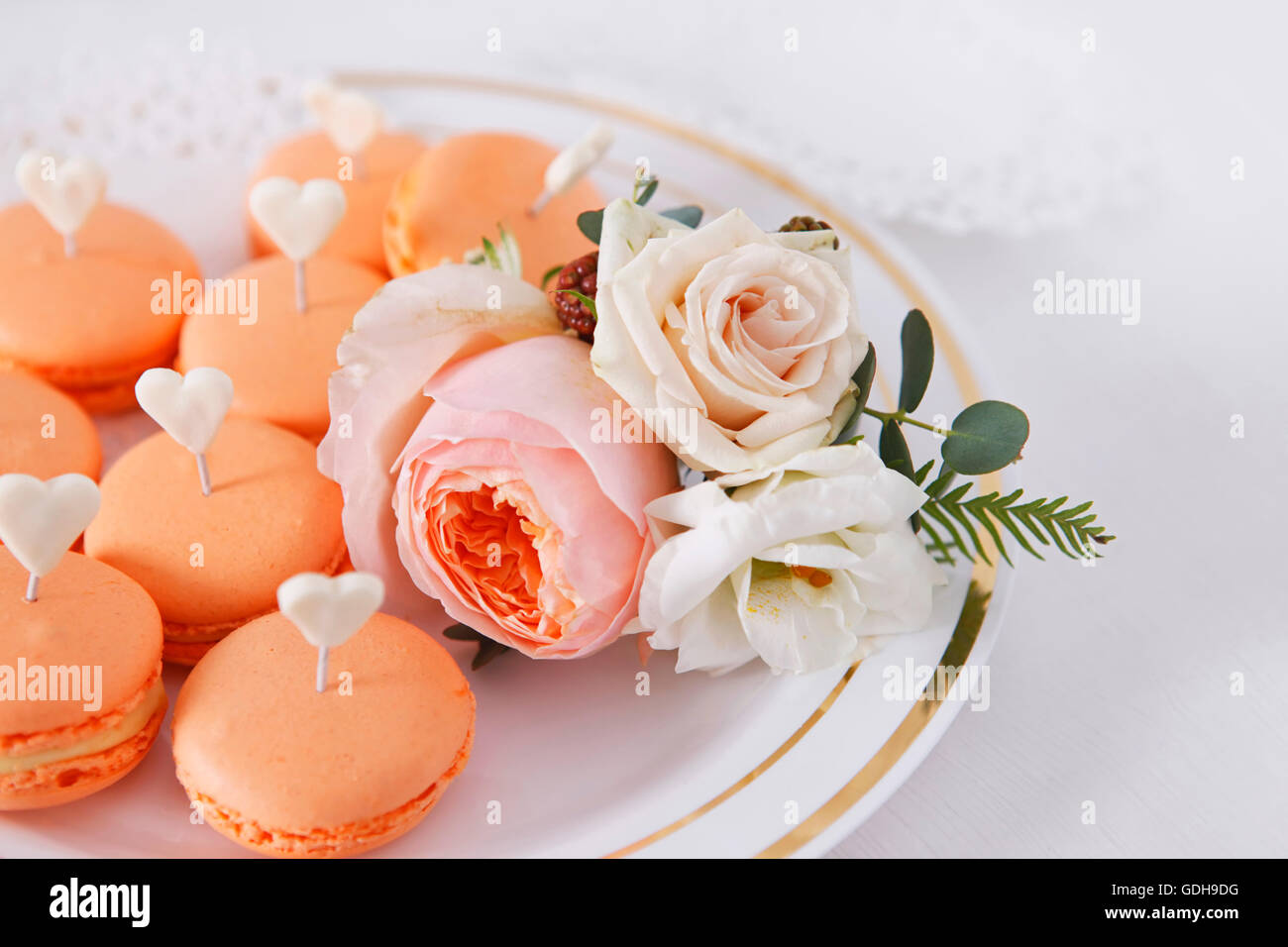 Cakes and boutonniere with roses Stock Photo - Alamy
