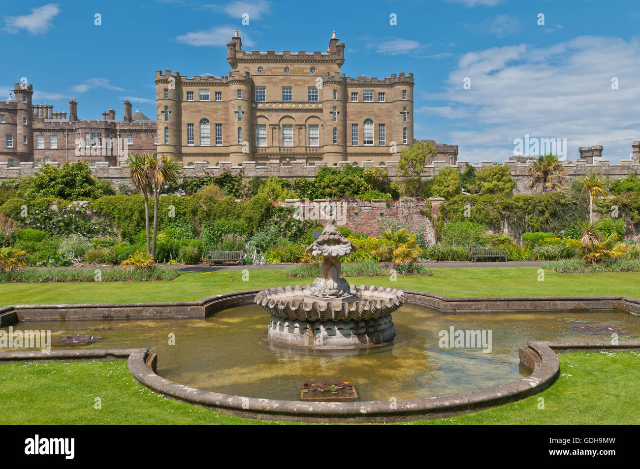 Culzean Castle with fountain and flower beds and terrace, Culzean Country park nr Maybole South Ayrshire, Scotland UK 07/2011 Stock Photo