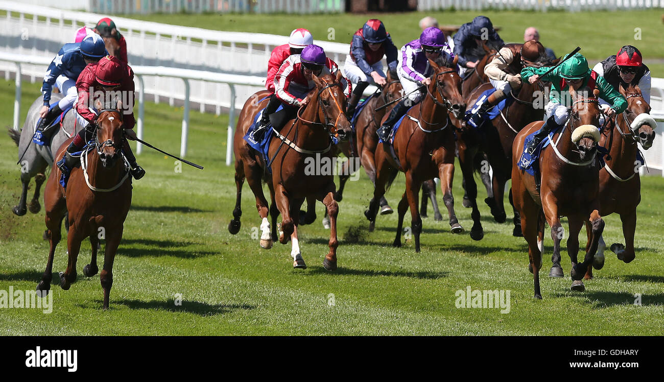 Velveteen ridden by Colin Keane (left) on the way to winning the Qipco European Breeders Fund Fillies Maiden during day two of the Darley Irish Oaks Weekend at Curragh Racecourse, Co. Kildare, Ireland. Stock Photo