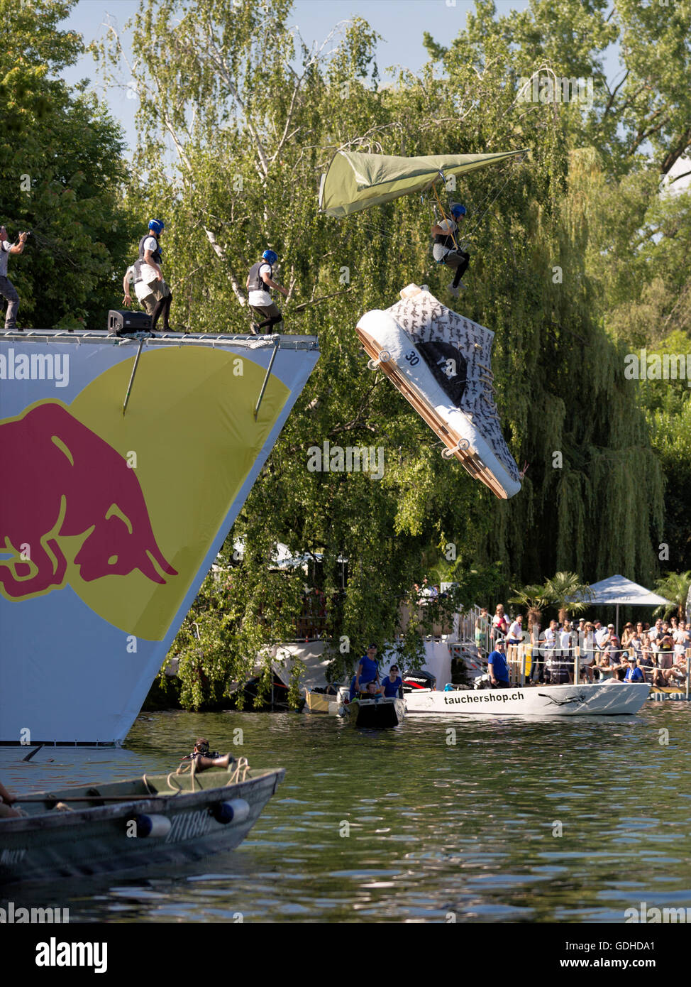 Zuerich, Switzerland. 16th July, 2016. The team "Kanye West's Yeezy Boost  350" pushing their flying vehicle over the ramp at Red Bull Flugtag in  Zuerich, Switzerland. Credit: Carsten Reisinger/Alamy Live News Stock