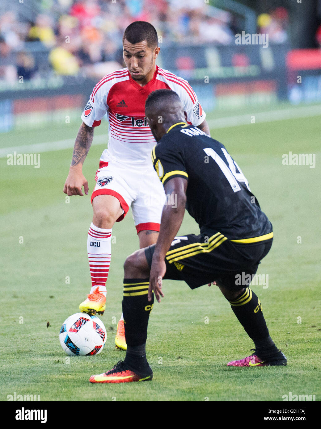 Columbus, U.S.A. 16th July, 2016. July 16, 2016: D.C. United midfielder Luciano Acosta (11) goes one on one with Columbus Crew SC defender Waylon Francis (14). Columbus, Ohio, USA. (Brent Clark/Alamy Live News) Stock Photo