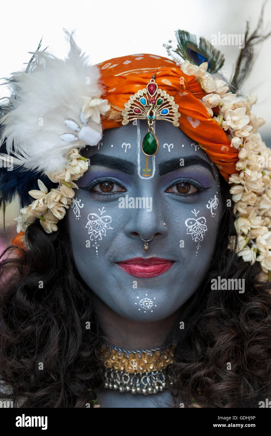 London UK. 17 July 2016. A girl dressed as Lord Krishna. Devotees celebrate the annual Rathayatra festival cart festival in central London. Hare Krishna followers towed three huge decorated carts from...