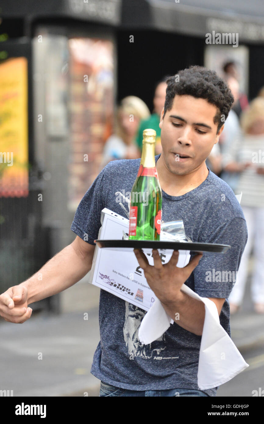 Soho, London, UK. 17th July, 2016. The traditional Soho Waiters Race