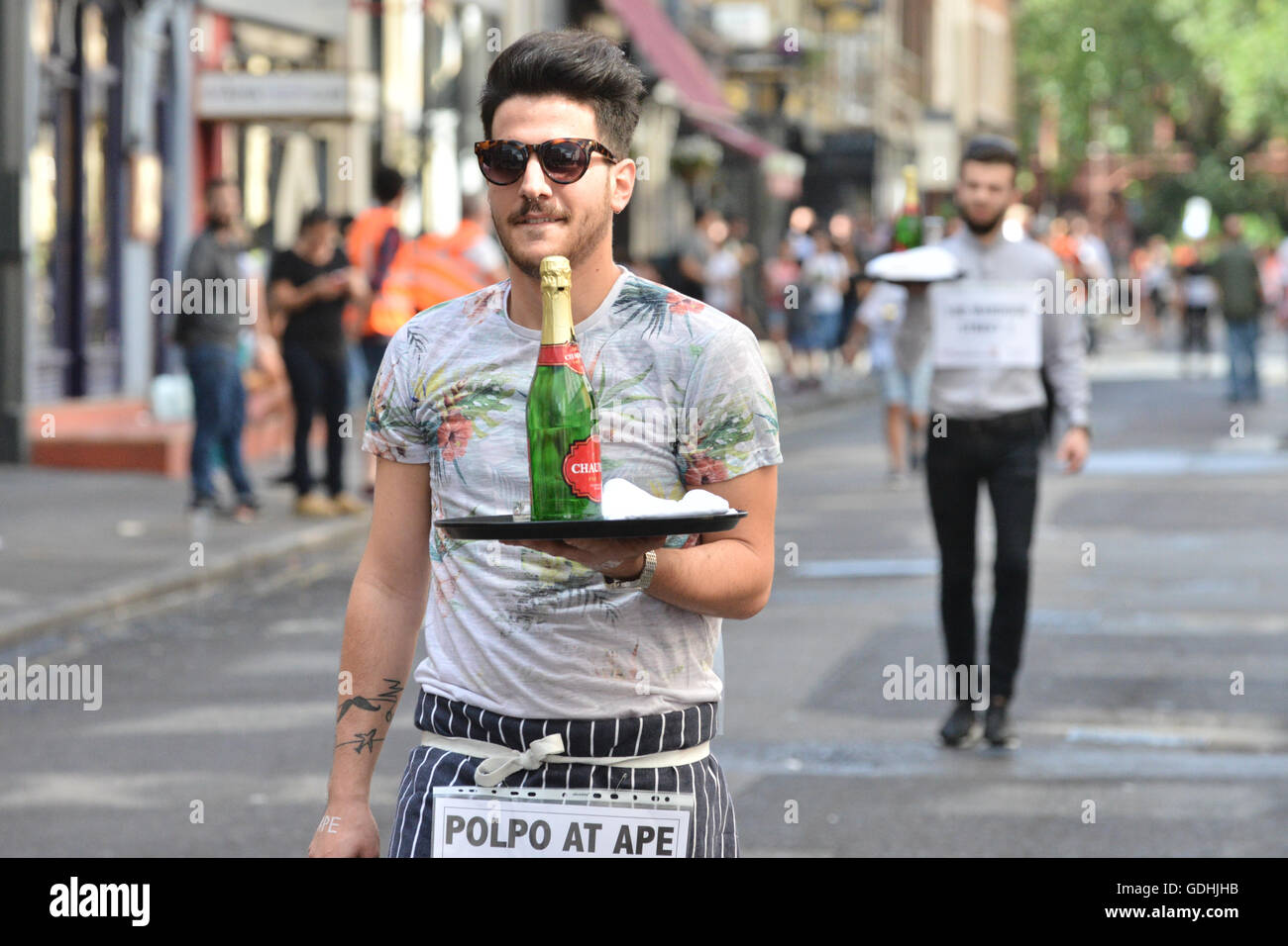Soho, London, UK. 17th July, 2016. The traditional Soho Waiters Race