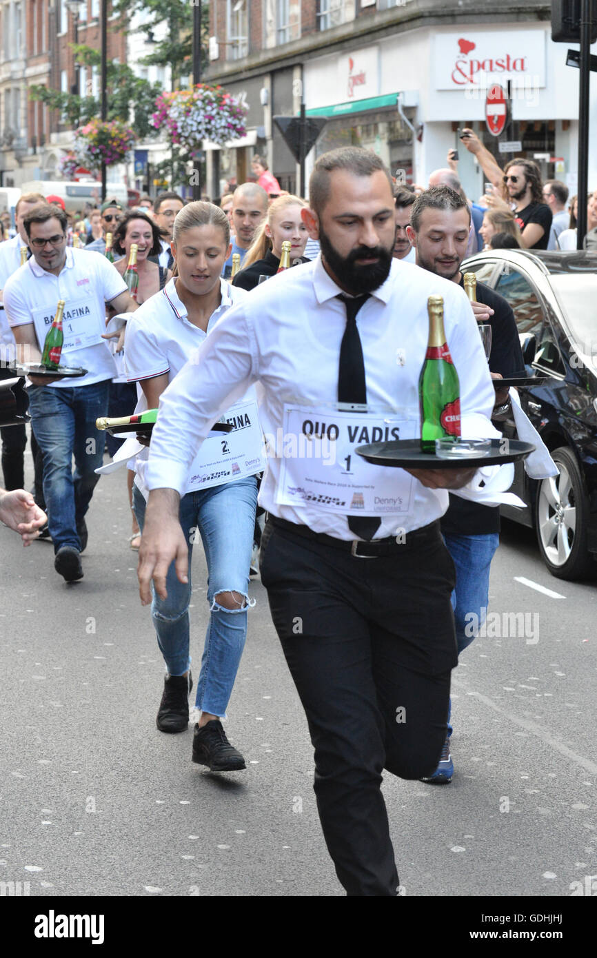 Soho, London, UK. 17th July, 2016. The traditional Soho Waiters Race