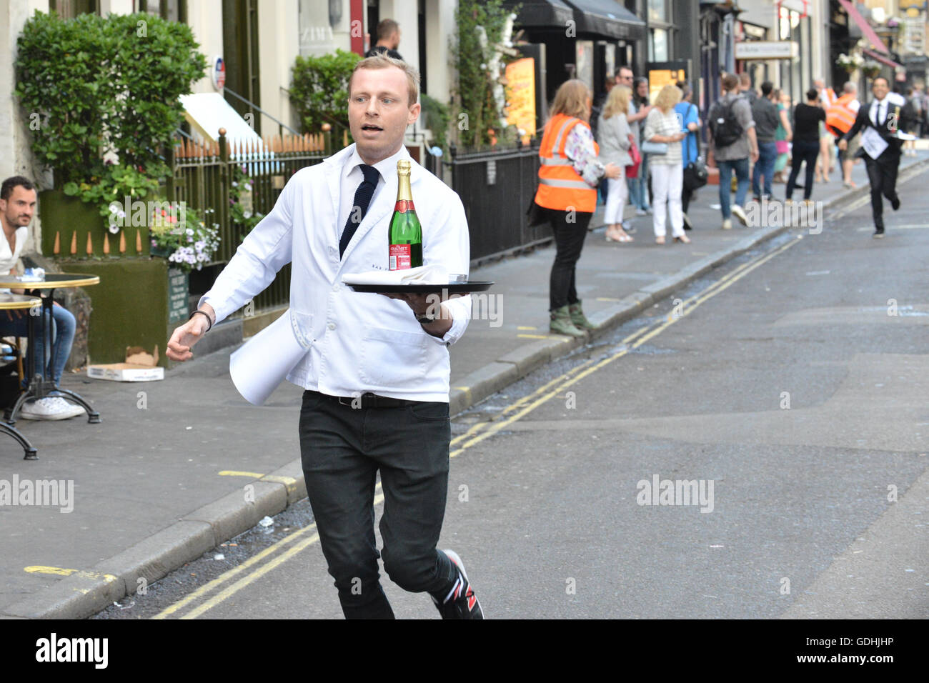 Soho, London, UK. 17th July, 2016. The traditional Soho Waiters Race