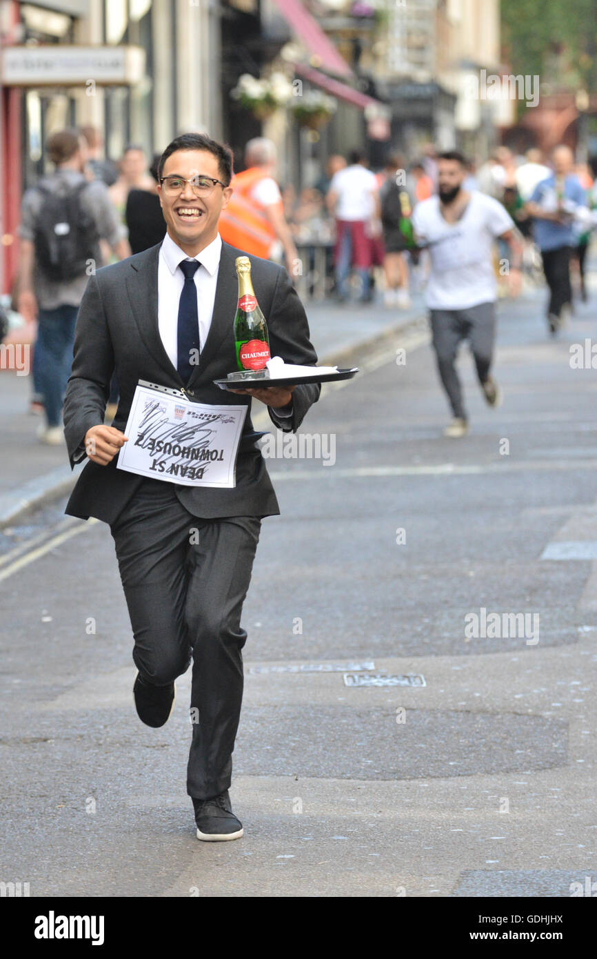 Soho, London, UK. 17th July, 2016. The traditional Soho Waiters Race
