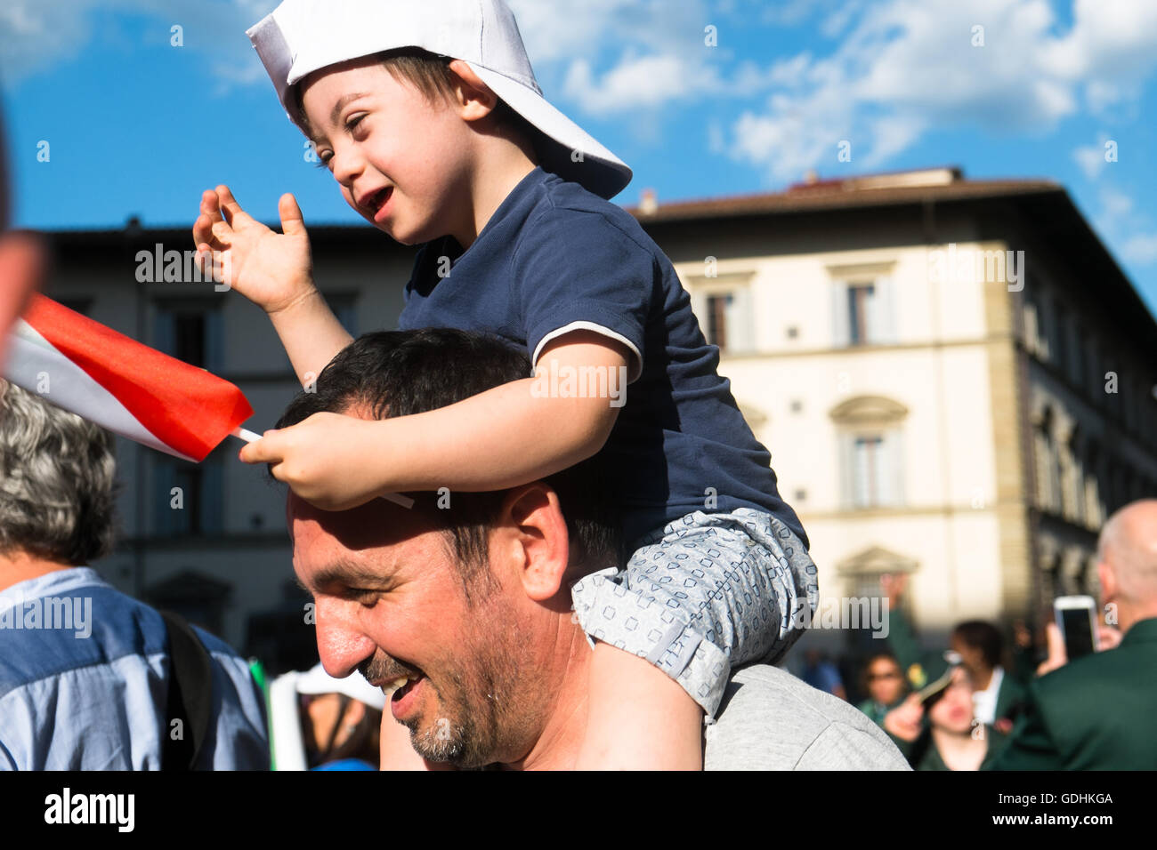 Florence, Italy. 16th July, 2016. Trisome Games 2016. Florence, Italy. Down syndrome italian child and his father during the show of the first day opening ceremony. Credit:  lorenzo codacci/Alamy Live News Stock Photo