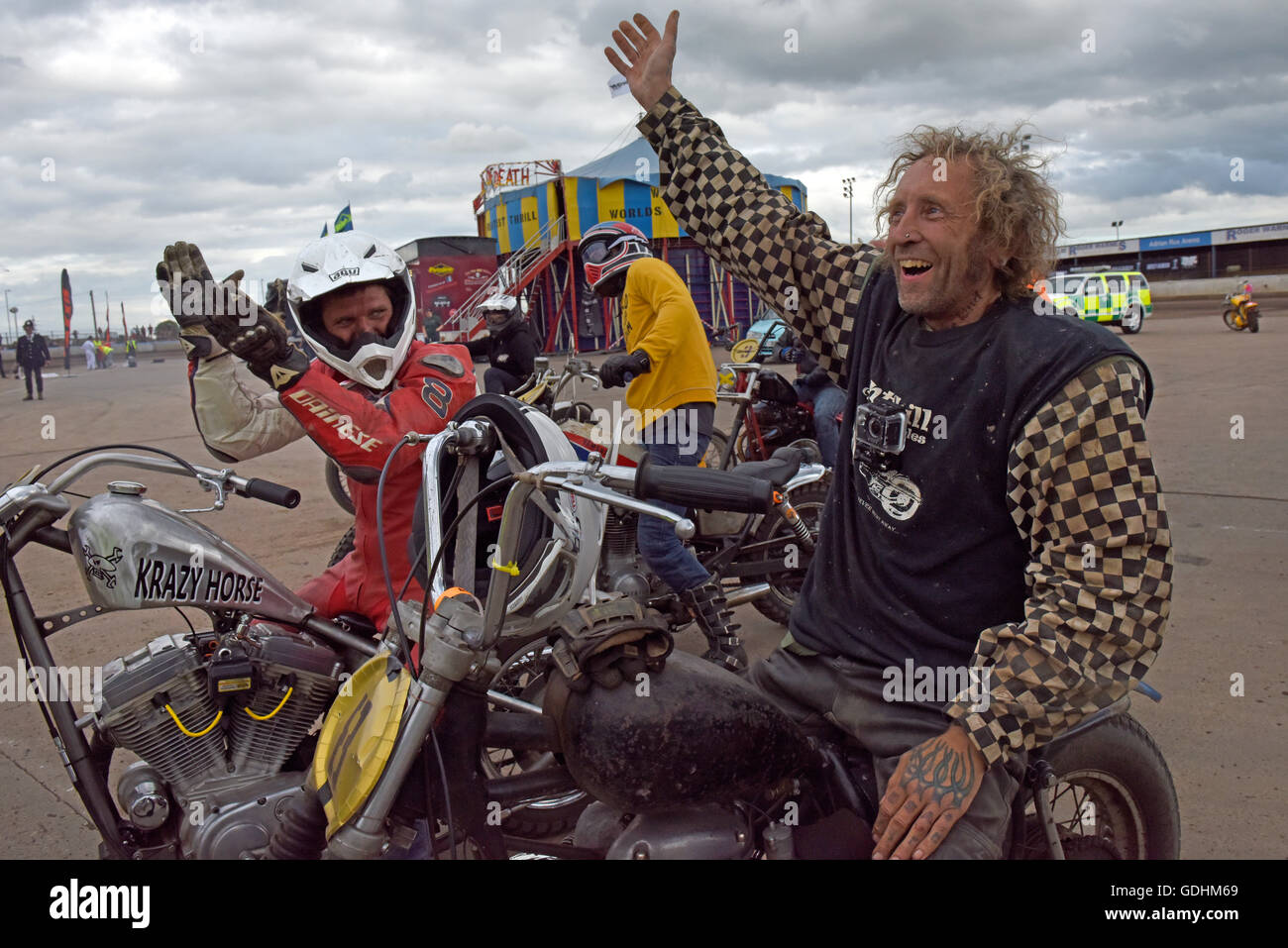 Kings Lynn, Norfolk, United Kingdom. 16.07.2016. Fifth annual Dirt Quake festival with Guy Martin and Carl FogartyKings Lynn, Norfolk, United Kingdom. 16.07.2016. Fifth annual Dirt Quake festival at the Adrian Flux Arena, Norfolk. Dirt Quake is racing road bikes on a dirt track. Lorry mechanic, Mortorbike Racer and TV celebrity Guy Martin races on a Crazy Horse Harley Davidson (pictured, loosing to racer, Odgie) and World Superbike racer, Carl Fogerty MBE races a Triumph. Classes include Inappropriate Road Bike, Ladies, and Street Tracker. Stock Photo