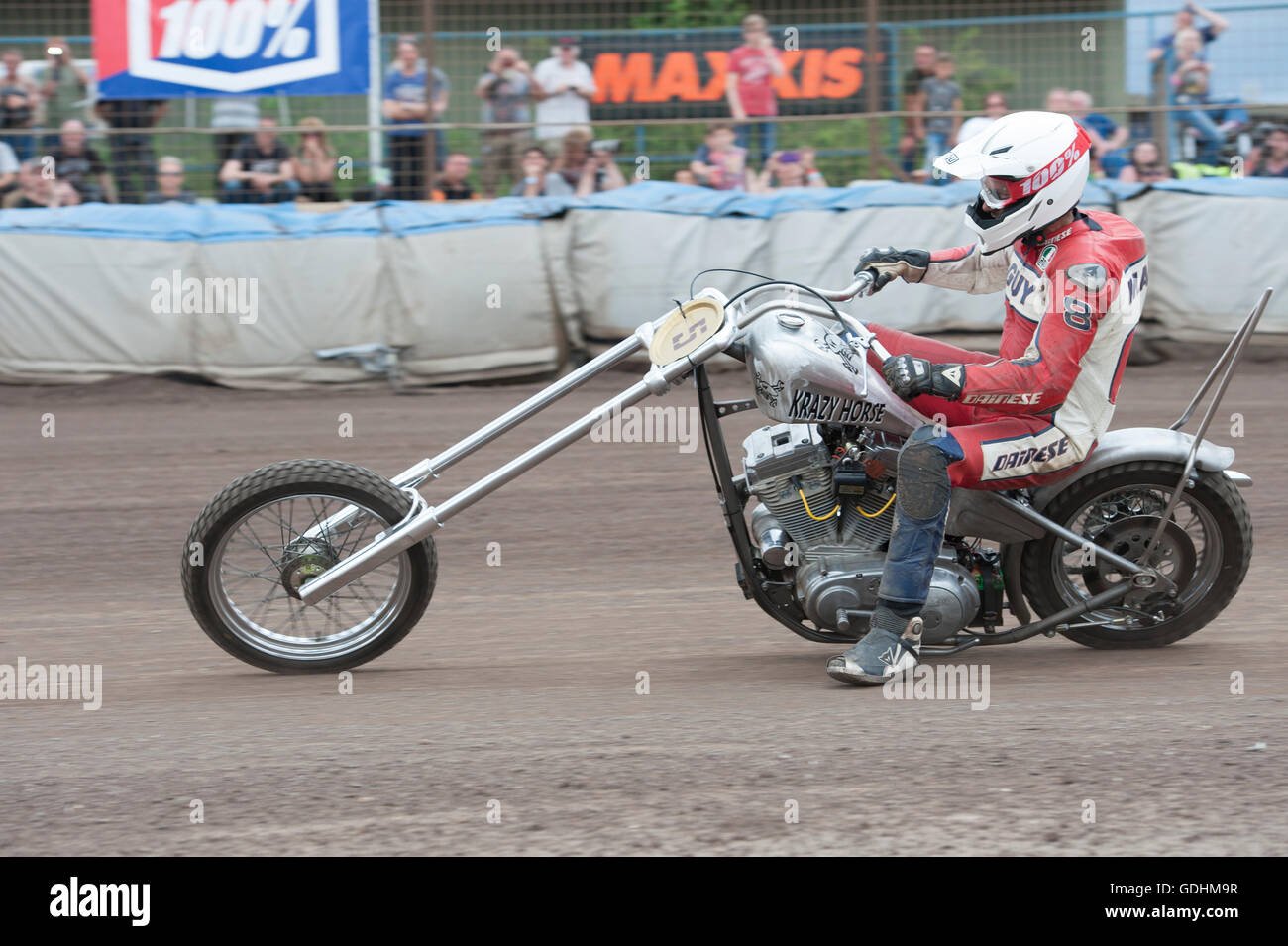 Kings Lynn, Norfolk, United Kingdom. 16.07.2016. Fifth annual Dirt Quake festival at the Adrian Flux Arena, Norfolk. Dirt Quake is racing road bikes on a dirt track. Lorry mechanic, Mortorbike Racer and TV celebrity Guy Martin races on a Crazy Horse Harley Davidson (pictured) and World Superbike racer, Carl Fogerty MBE races a Triumph. Classes include Inappropriate Road Bike, Ladies, and Street Tracker. Stock Photo