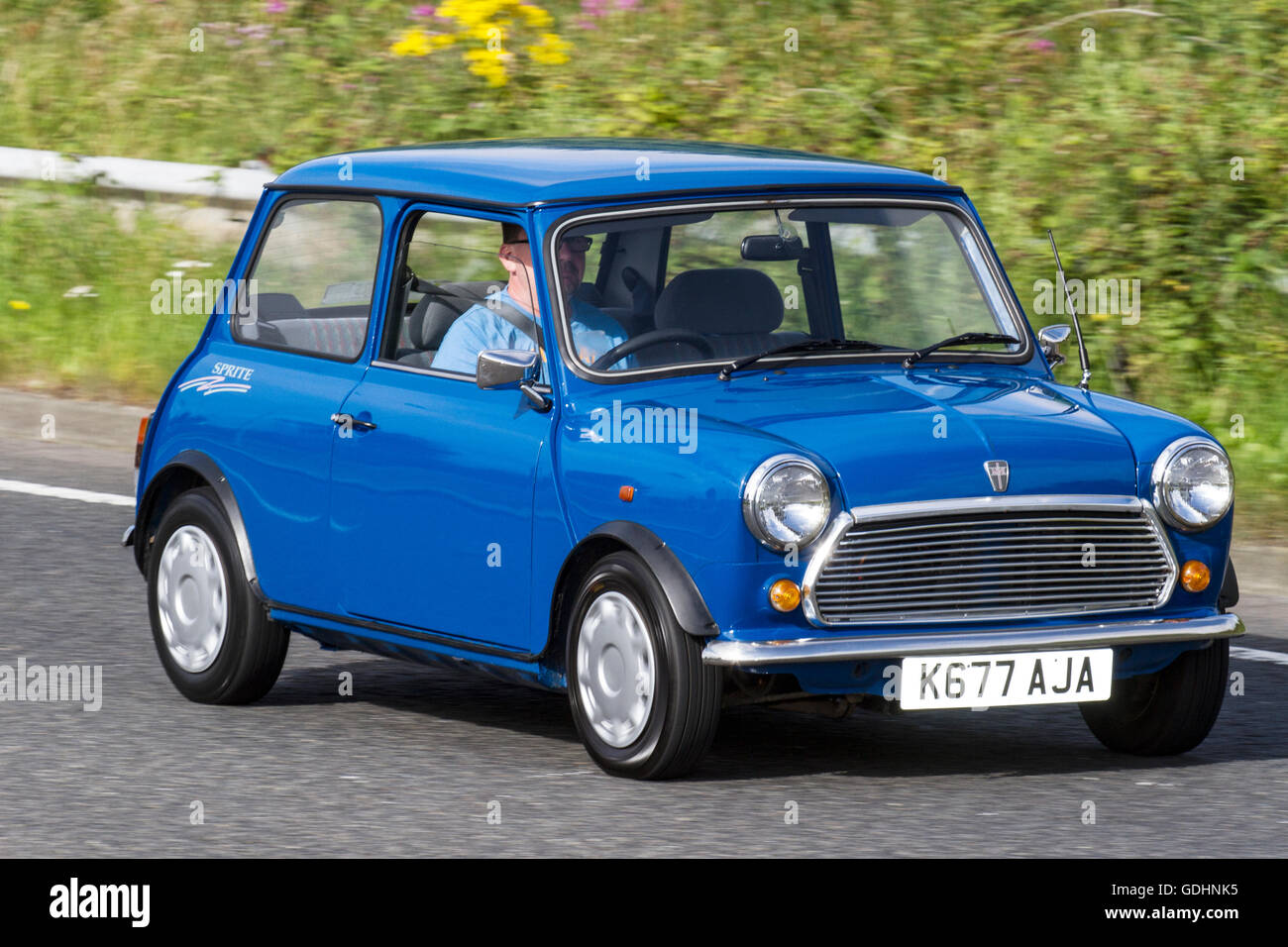 1993 90s nineties blue Rover Mini Sprite; Fleetwood car show, cars vintage antique restored vehicles, show festival restoration, classic cars, cherished, veteran, old timer, restored, collectable, motors, vintage, heritage, old preserved classic classics autos automobile. Stock Photo