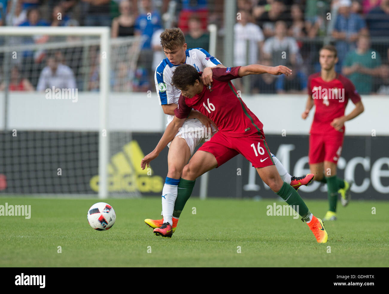 Stuttgart, Germany. 17th July, 2016. Italy's Nicolo Barella (L) and Portugal's Bruno Xadas vie for the ball during the U19 European Chamionship soccer match between Italy and Portugal in the Gazi-Stadion auf der Waldau in Stuttgart, Germany, 17 July 2016. Photo: DENIZ CALAGAN/dpa/Alamy Live News Stock Photo