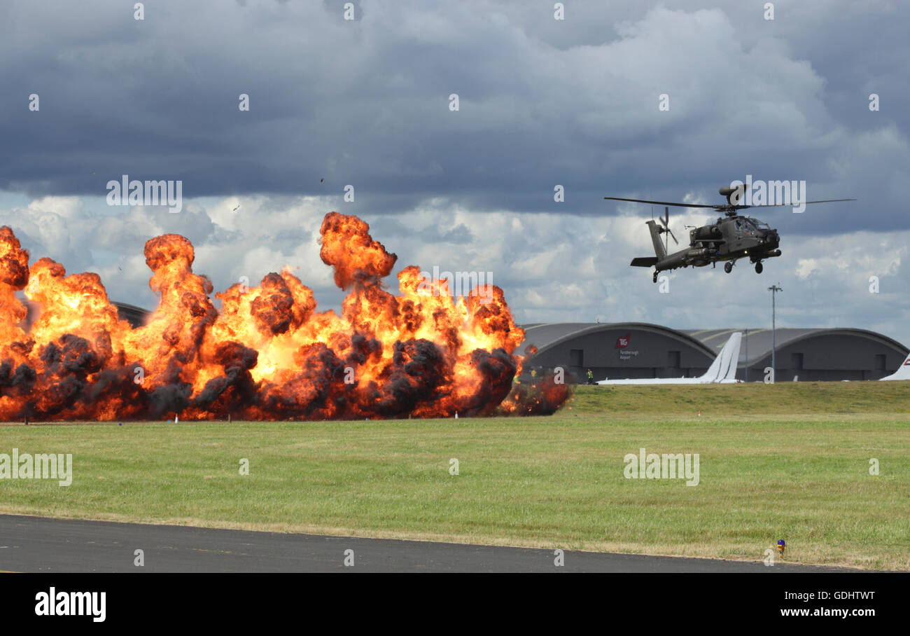 Farnborough Airshow UK 2016  Wall of Fire and Apache helicopter Stock Photo