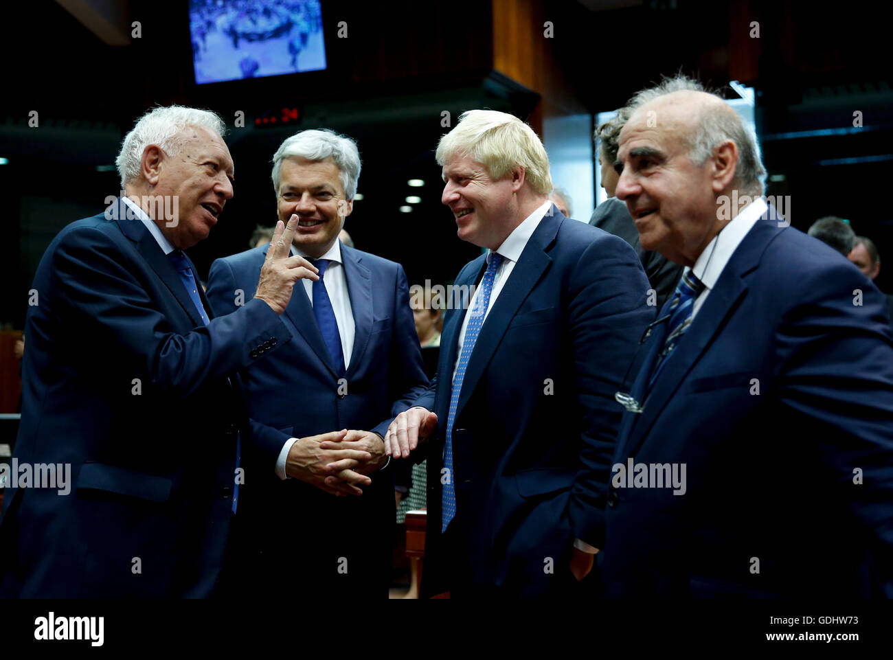 Brussels, Belgium. 18th July, 2016. Spanish Foreign Minister Jose Manuel Garcia-Margallo, Belgian Foreign Minister Didier Reynders, British Foreign Secretary Boris Johnson and Maltese Minister for Foreign Affairs George W. Vella (from L to R) talk prior to an EU foreign ministers' meeting at its headquarters in Brussels, Belgium, July 18, 2016. The meeting's agenda is expected to be focused on issues of anti-terrorism, Turkey and Syria. Credit: Ye Pingfan/Xinhua/Alamy Live News Stock Photo