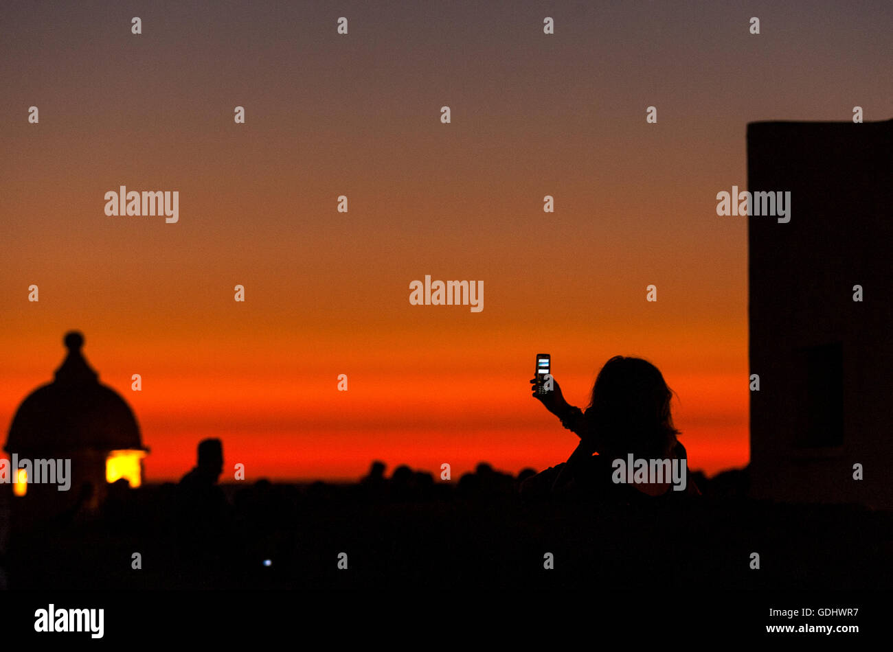 Mobile and Sunset. © Miguel Gomez Stock Photo