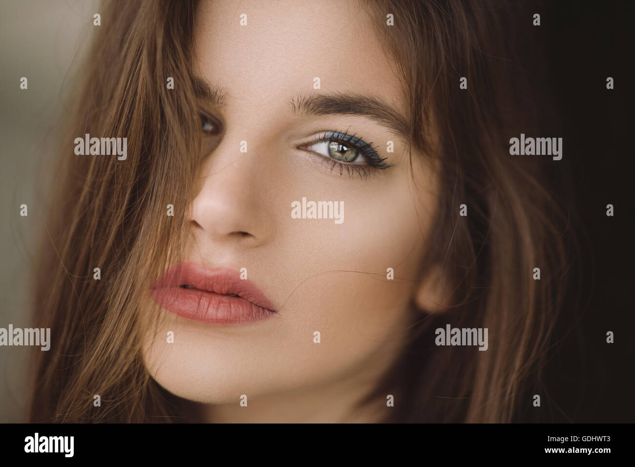 Closeup portrait of a beautiful young woman Stock Photo - Alamy