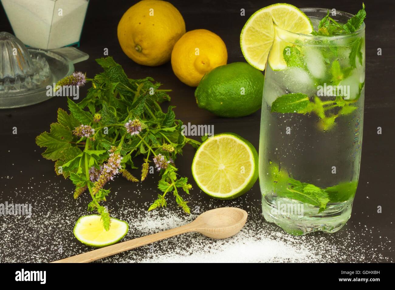 Homemade lemonade with fresh lemon and mint. Cool, refreshing dip in the hot summer. Stock Photo