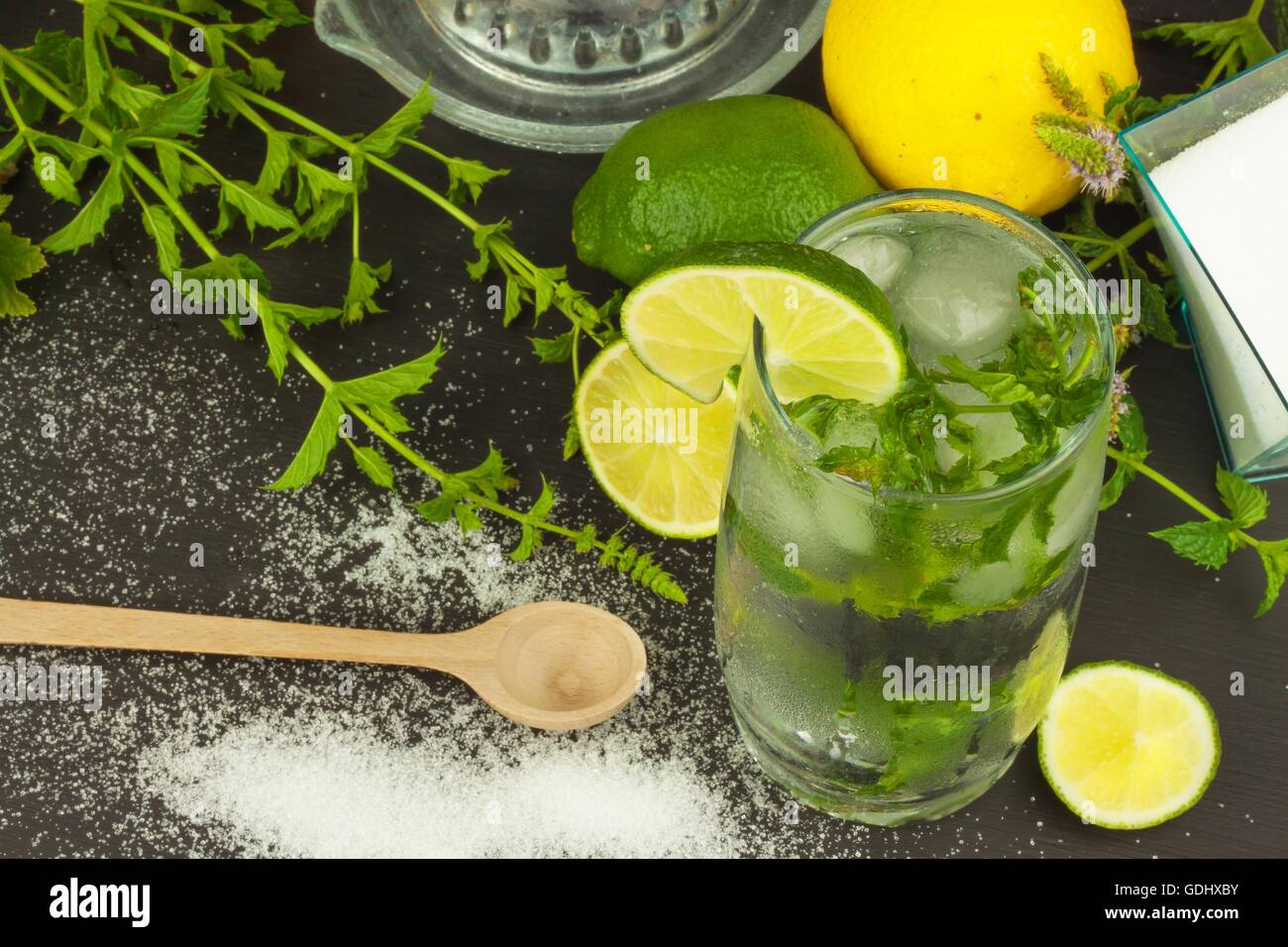 Homemade lemonade with fresh lemon and mint. Cool, refreshing dip in the hot summer. Stock Photo