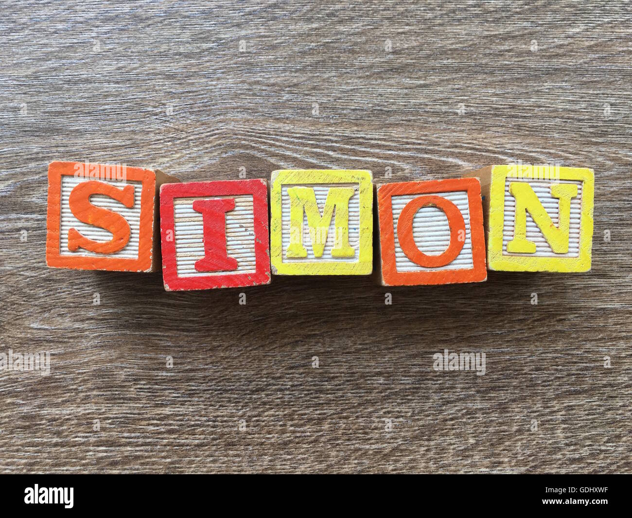 Simon name written with wood block letter toys Stock Photo Alamy