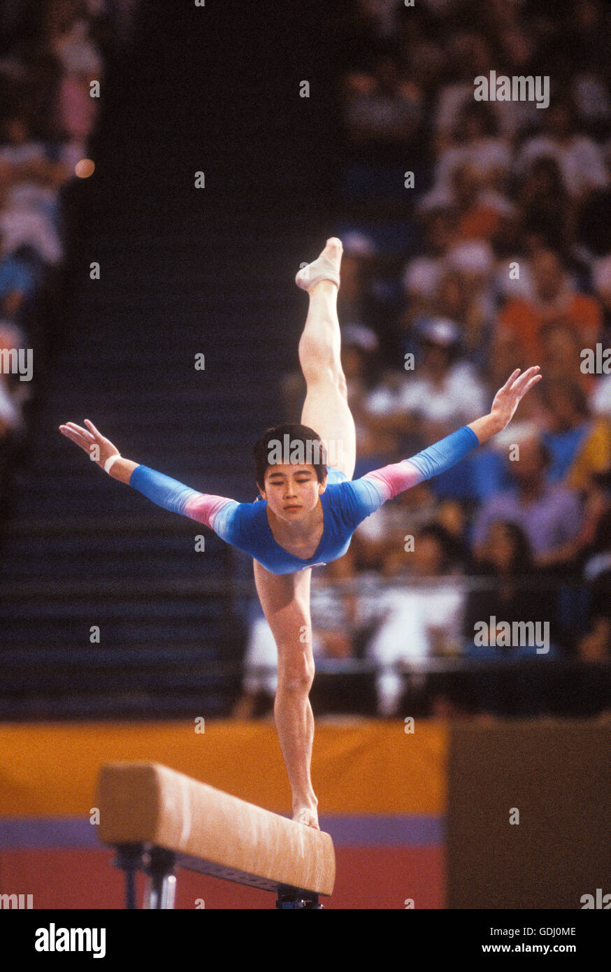 Japanese gymnast competing on balance beam during 1984 Olympic Games in