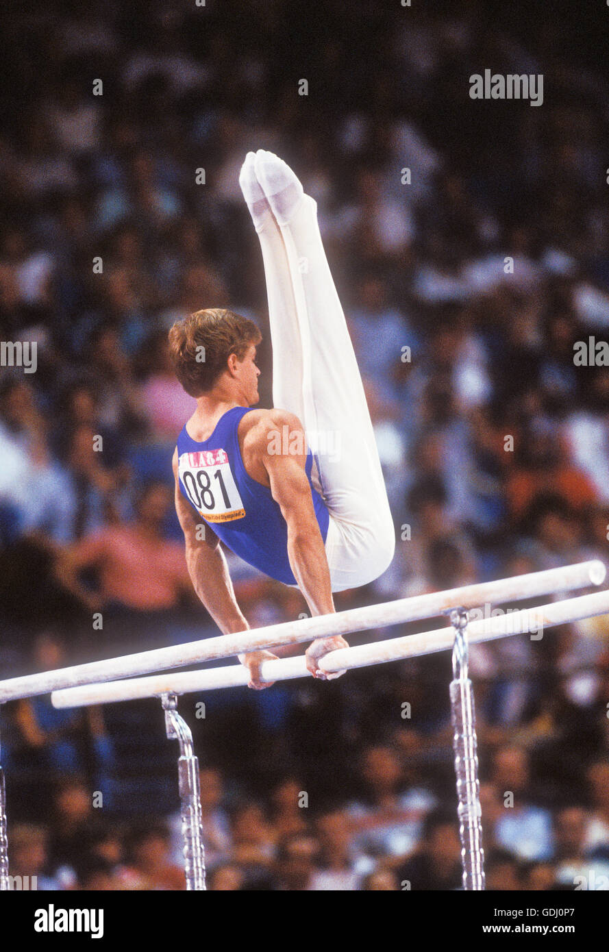 Peter Vidmar performs on parallel bars at 1984 Olympic Games in Los Angeles. Stock Photo