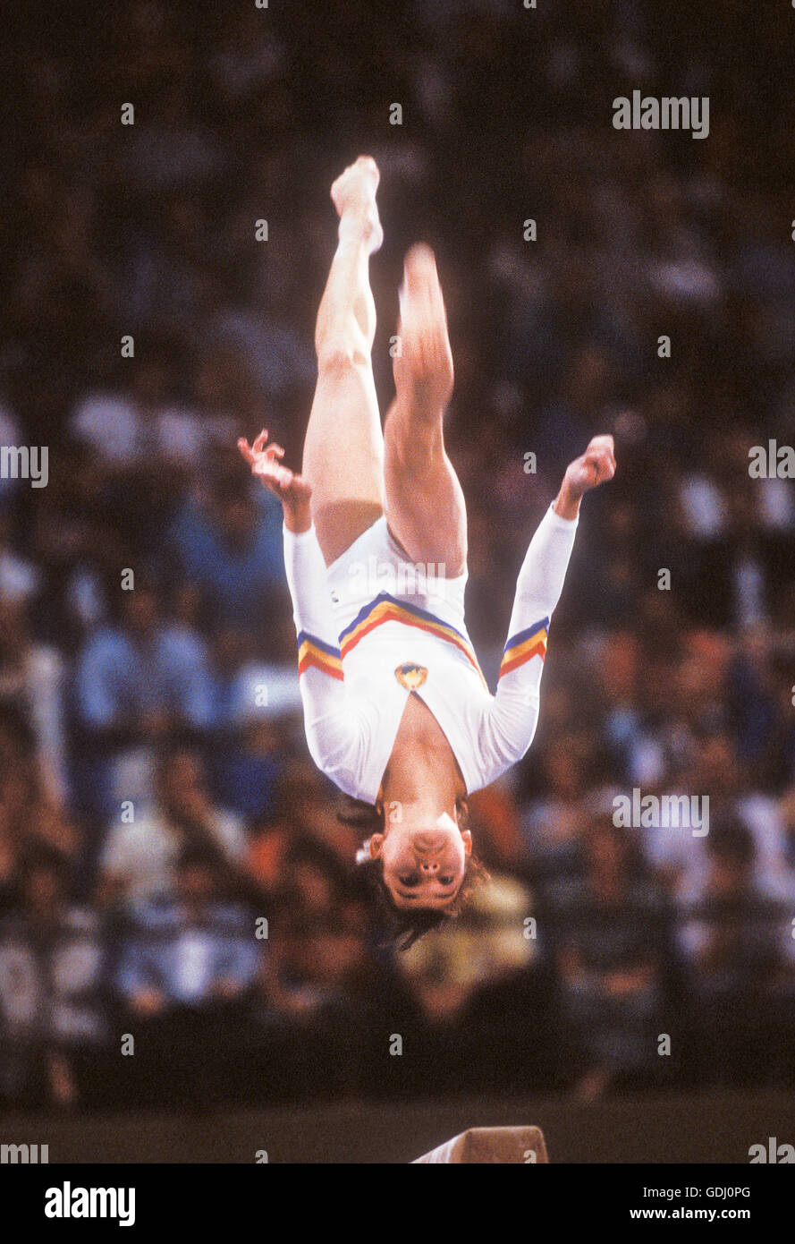Romanian gymnast performs on balance beam during competition at 1984 Olympic Games in Los Angeles. Stock Photo