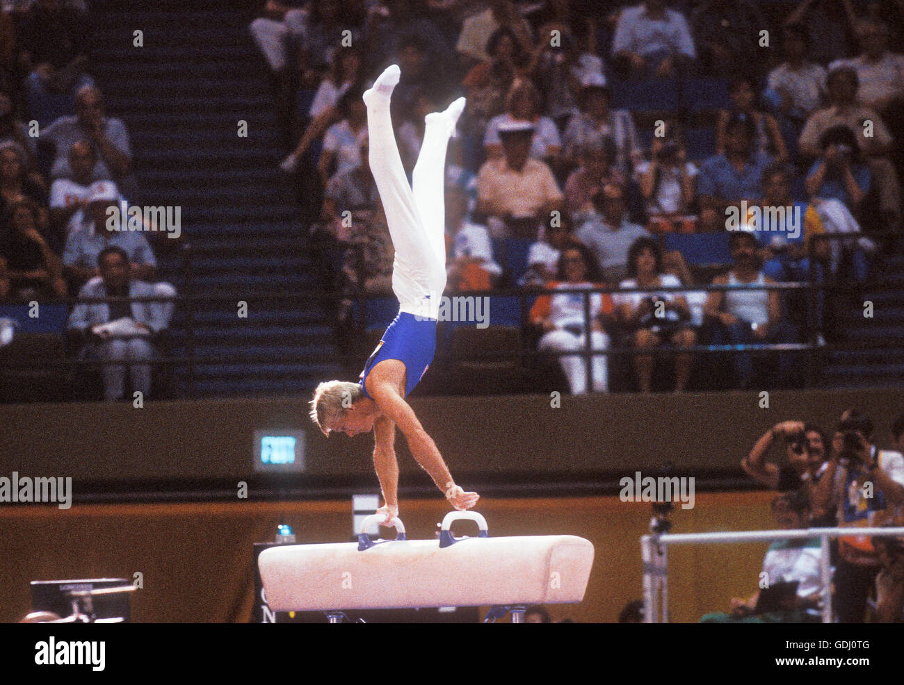 Bart Conner of USA performs on pommel horse at 1984 Olympic Games in Los Angeles. Stock Photo