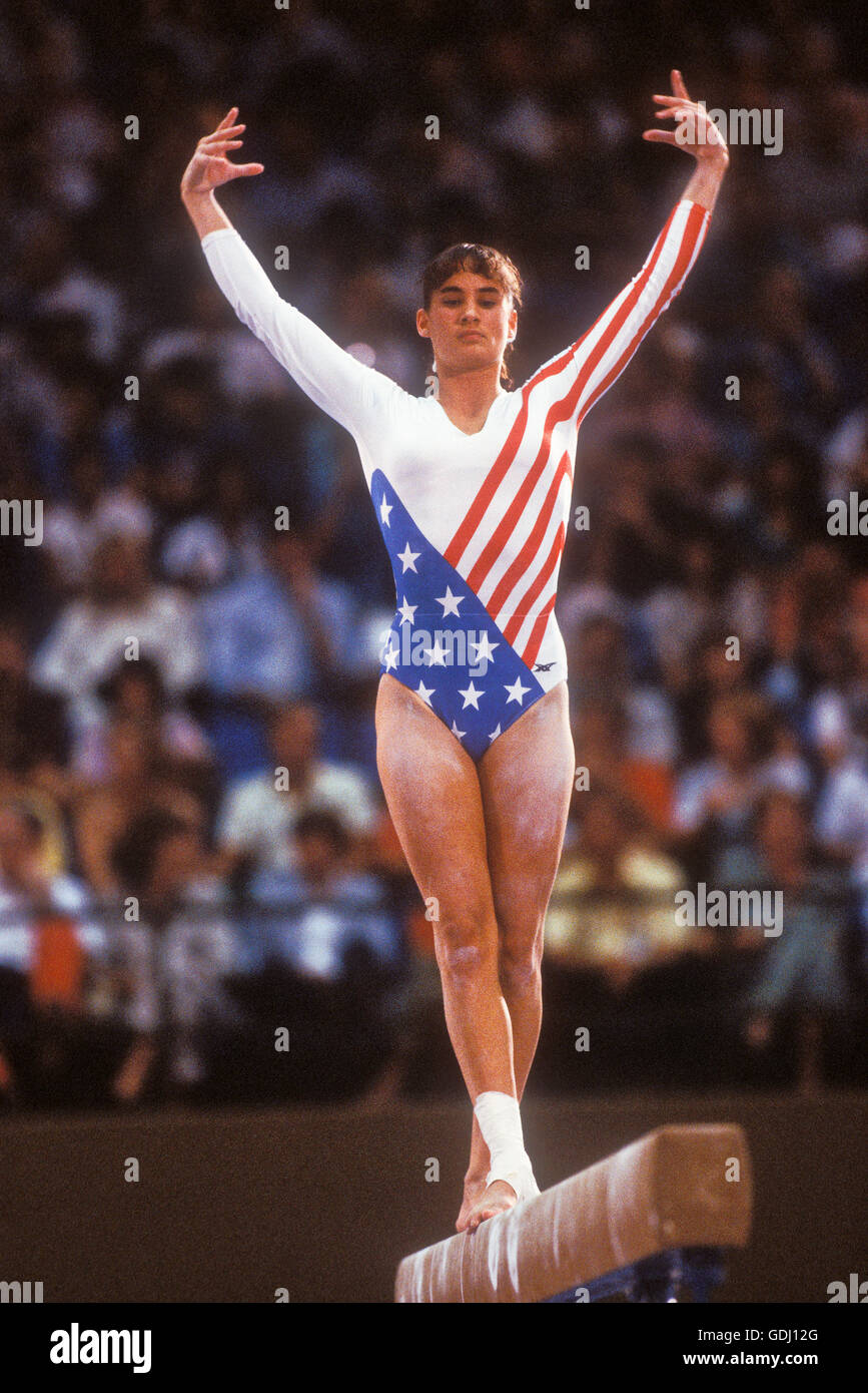 Tracee Talavera of USA performs on women's balance beam during competition at 1984 Olympic Games in Los Angeles. Stock Photo