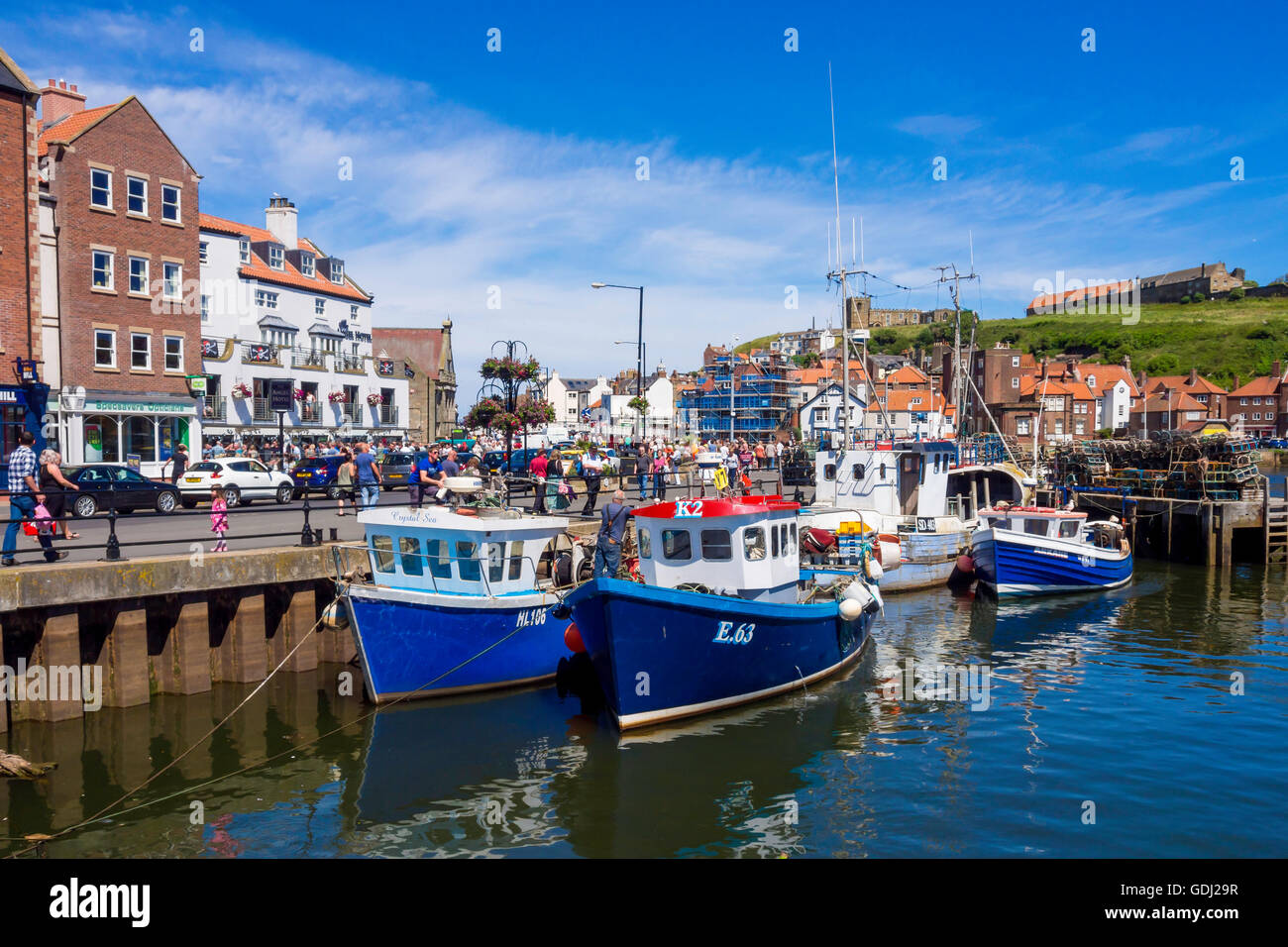 Fishing boats at New Quay Wharf in Whitby harbour North Yorkshire UK Stock Photo