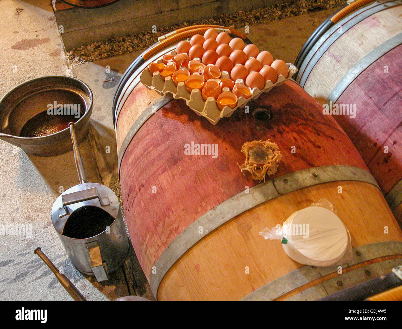 egg white clarification of red wine in barrels at Château Léoville ...